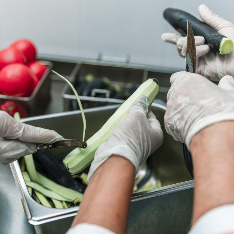 Peeling or cutting vegetables in the kitchen